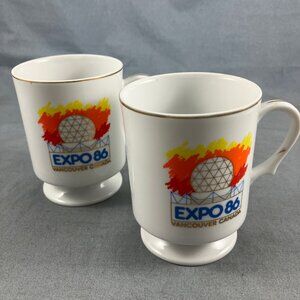 TWO 1986 Expo 86 Vancouver Coffee Mug Tea Cup 6 oz Footed Pedestal Made Japan